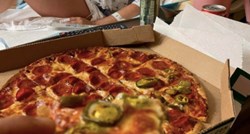 Budući tata kraj žene u rađaoni jeo pizzu, ljudi se ne mogu dogovoriti je li to ok