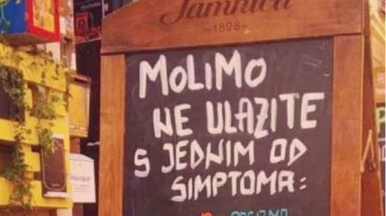 Natpis ispred lokala u Rijeci privukao poglede: Ne ulazite s ovim simptomima