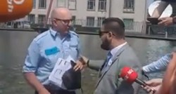 VIDEO Incident u Haagu, muškarac došao s transparentom podrške Mladiću