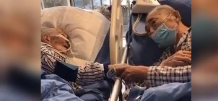 Snimka na kojoj se stariji par s koronavirusom oprašta u bolnici slama srca