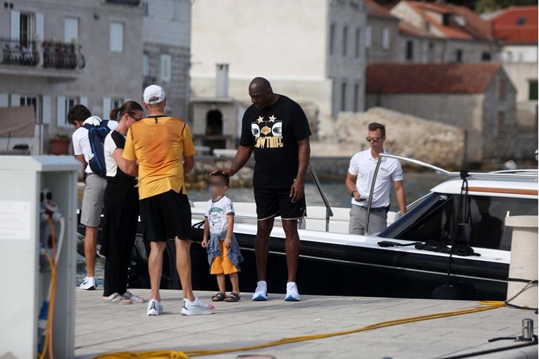 Magic Johnson posed for fan photos on the island of Vis