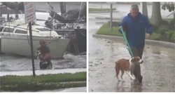 Ovaj čovjek skočio je u more kako bi spasio psa usred oluje uragana Ian