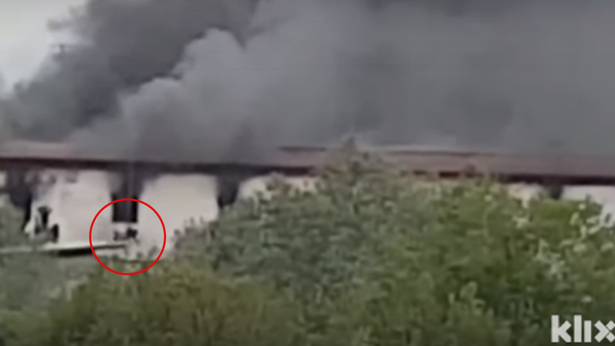 VIDEO Migrant skočio kroz prozor gorućeg prihvatnog centra da bi se spasio