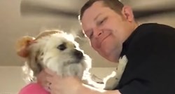 Ljubomorni pas želi biti dio obiteljskog zagrljaja, pogledajte njegovu reakciju