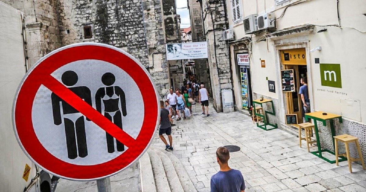 ANKETA Kažnjavamo turiste jer usred ljeta hodaju gradom u badiću. Ima li to smisla?