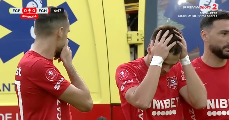 UZNEMIRUJUĆE Strašna ozljeda rumunjskog braniča. Primio se za glavu kad je vidio nogu