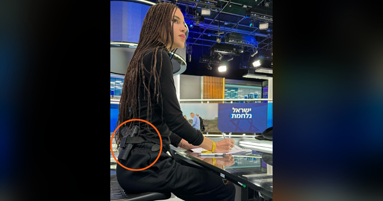 Izraelska voditeljica u TV studiju nosi pištolj za pojasom