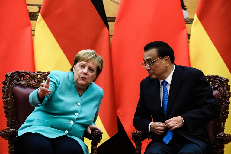 Kineski premijer na sastanku s Merkel prvi put komentirao nemire u Hong Kongu