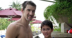 Dječak s ove fotografije s Phelpsom danas je junak Singapura i milijunaš