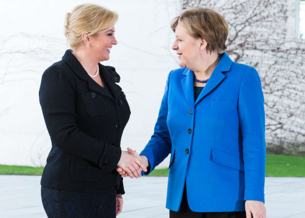Srdačan susret starih prijateljica Grabar-Kitarović i Merkel