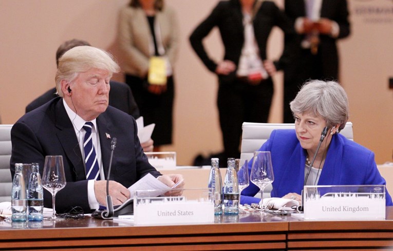 U Davosu se sastali Trump i May, dogovorili njegov posjet Londonu