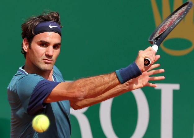 Federer lako u 2. kolo Dubaija, Azarenka izbacila Kerber
