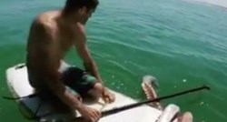 VIDEO Ako se spremate za more, ovo nemojte gledati: Divovska lignja se omotala surferu oko daske