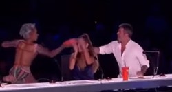VIDEO Simon Cowell rugao se braku Mel B, ona ga zalila vodom i izjurila iz studija usred live showa