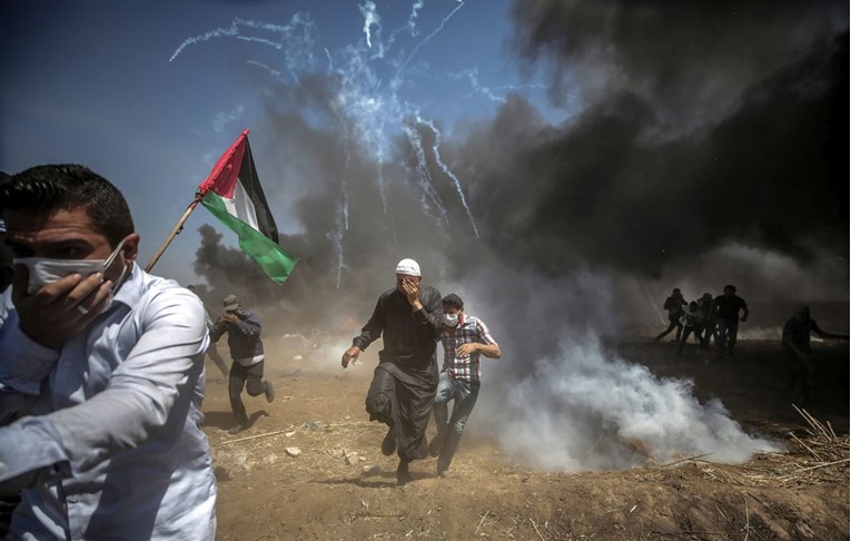 Dok Izraelci bombardiraju Hamas, Palestinci pokapaju mrtve