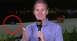 VIDEO BBC-ev reporter iz Rija genijalno se snašao kad je shvatio da se par iza njega seksa