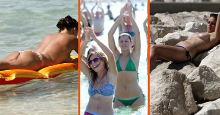 Paklene vrućine: Seksi turistkinje se rashlađuju u toplesu ili vježbanjem u moru
