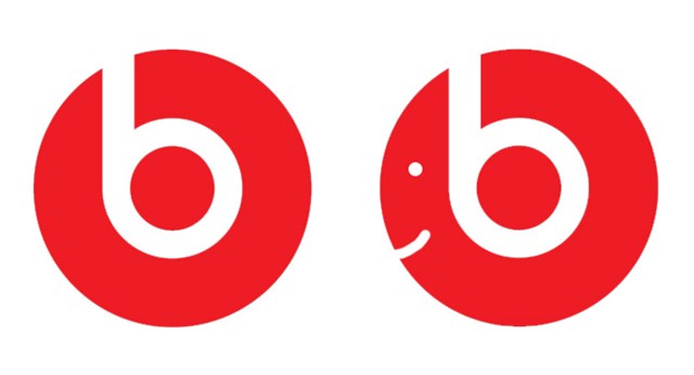 Beats by Dre slušalice- slovo B u crvenom krugu prikazuje Beats slušalice na glavi čovječuljka