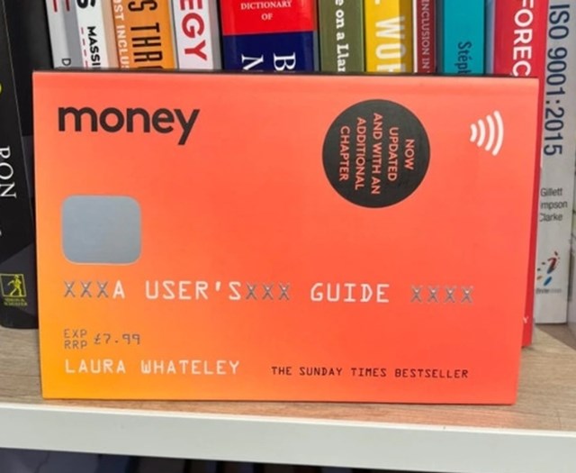 Knjiga o upravljanju novcem koja izgleda kao kartica.