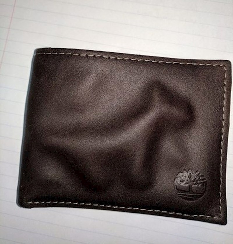 "Slučajno sam u perilici oprao novčanik, na njemu se pojavio pas. Vidite li ga?"