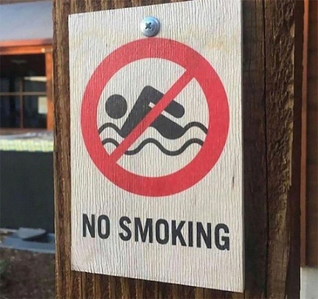 13. Oznaka zabranjuje pušenje iako je autor vjerojatno nešto pušio dok je radio