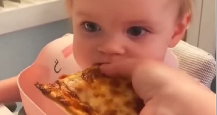 Reakcija bebe koja prvi put jede pizzu rastopila je svijet, danas nećete vidjeti ništa slađe!