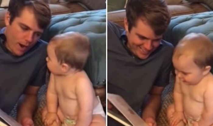 Tata je bebi čitao iz slikovnice, mama je snimala, a onda se dogodio čarobni trenutak