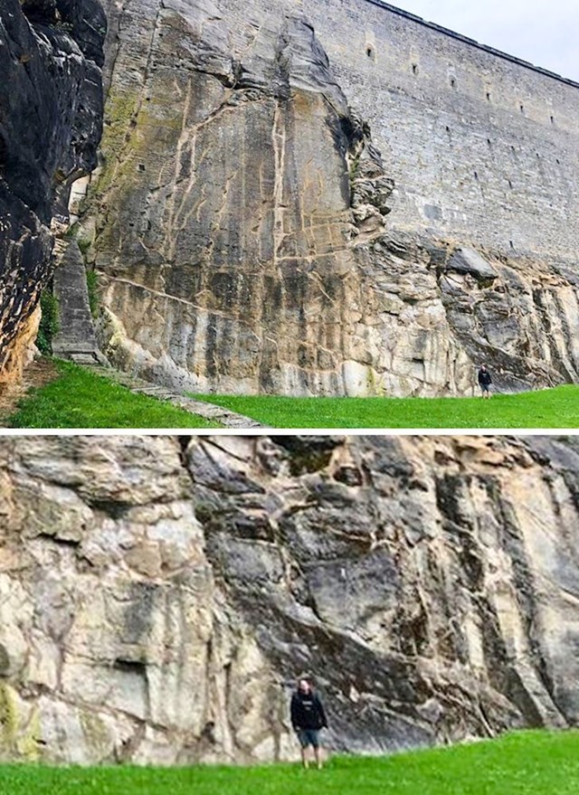 Zidine Königstein dvorca su ogromne. Jedan lik se slikao ispred njih kako bi usporedio veličinu.