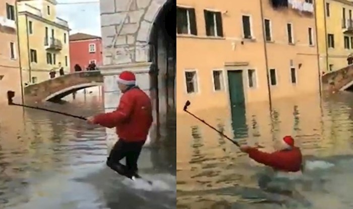 VIDEO Slikao se mobitelom za vrijeme velike plime u Veneciji i urnebesno upao u vodu