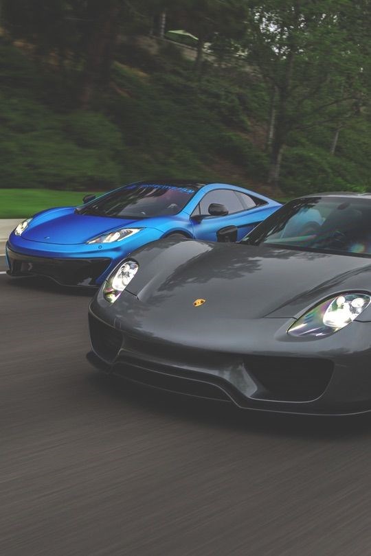 Porsche 918 Spyder and McLaren MP12-4C.