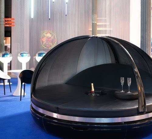 Awesome bed with a place for your drink and an iPhone dock.