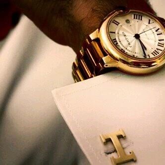 Hermes cufflings & Cartier watch.