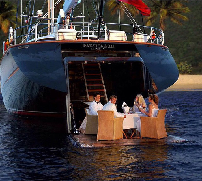 Dinner on Parsifal III's hydraulic platform.