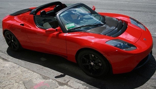 Red Tesla Roadster.