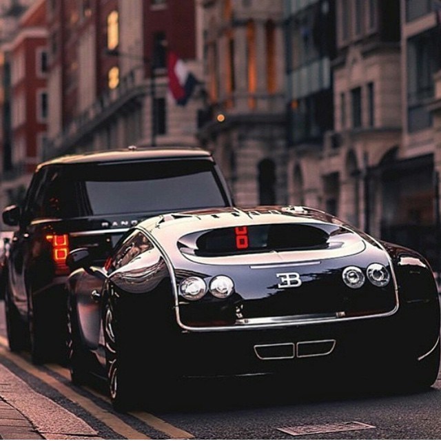 Bugatti Veyron and 2014 Range Rover.