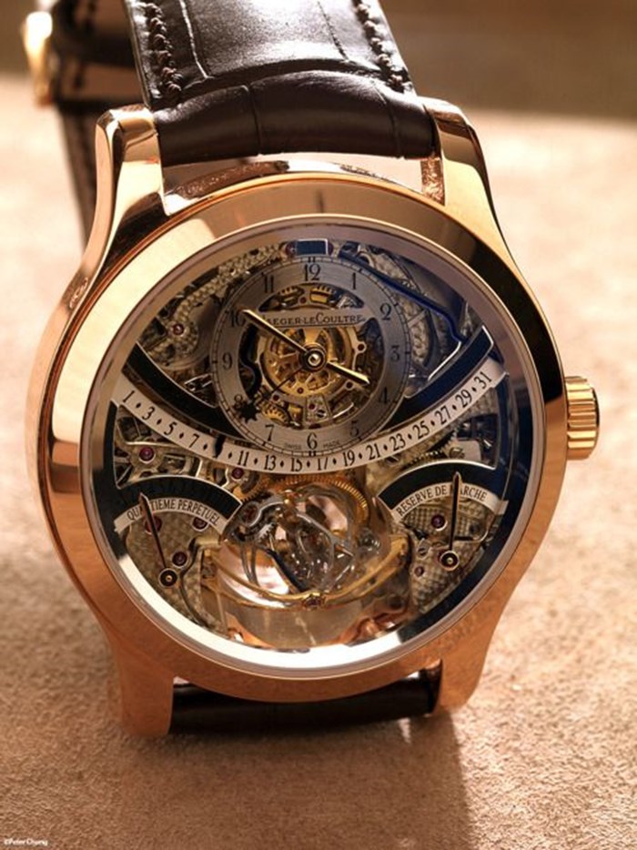 Jaeger-LeCoultre gold wristwatch.