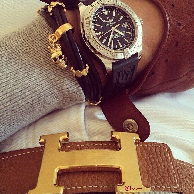 Breitling watch, Hermes belt.