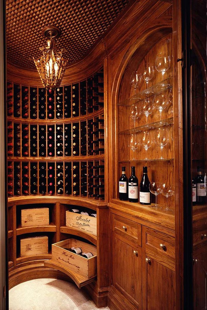 Curved wine room.