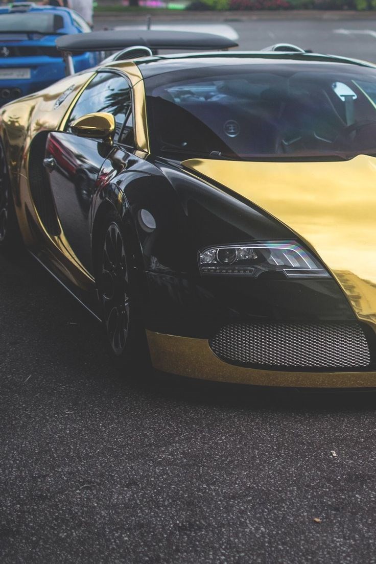 Gold and black Bugatti.