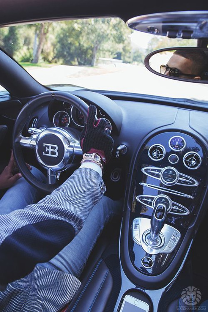 Driving a Bugatti.