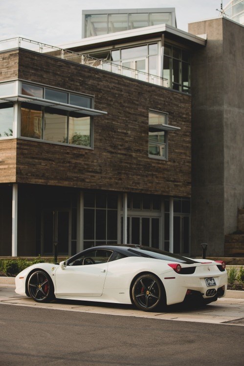 Modern bachelor pad and a supercar to go with it.