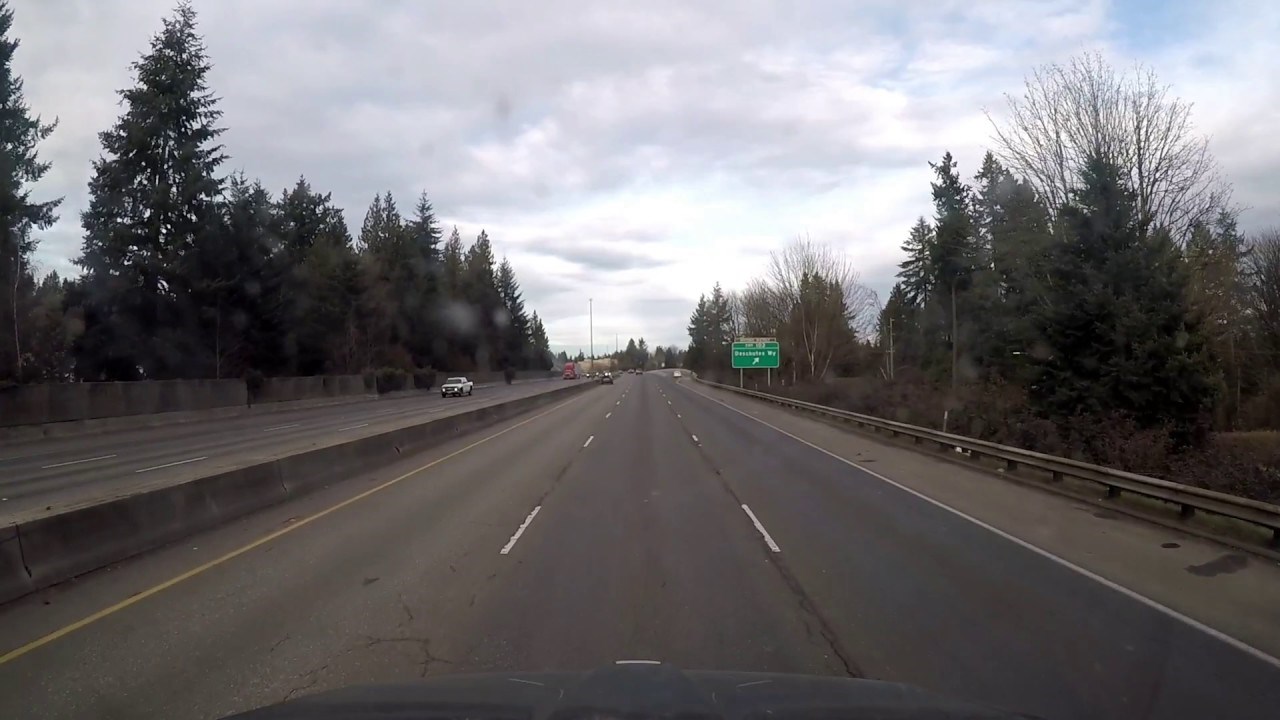 Motorcycle wrecks into car, winds up sitting on trunk