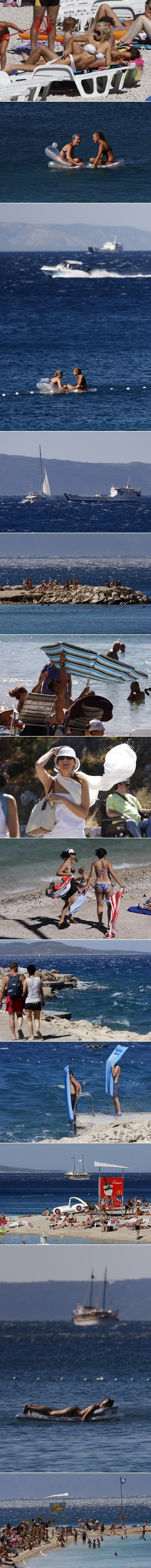 Ni bura im ne smeta: Plaža u Makarskoj i dalje puna turista