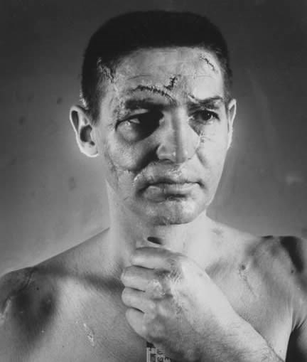 Lice hokejaškog golmana prije nego su nosili kacige