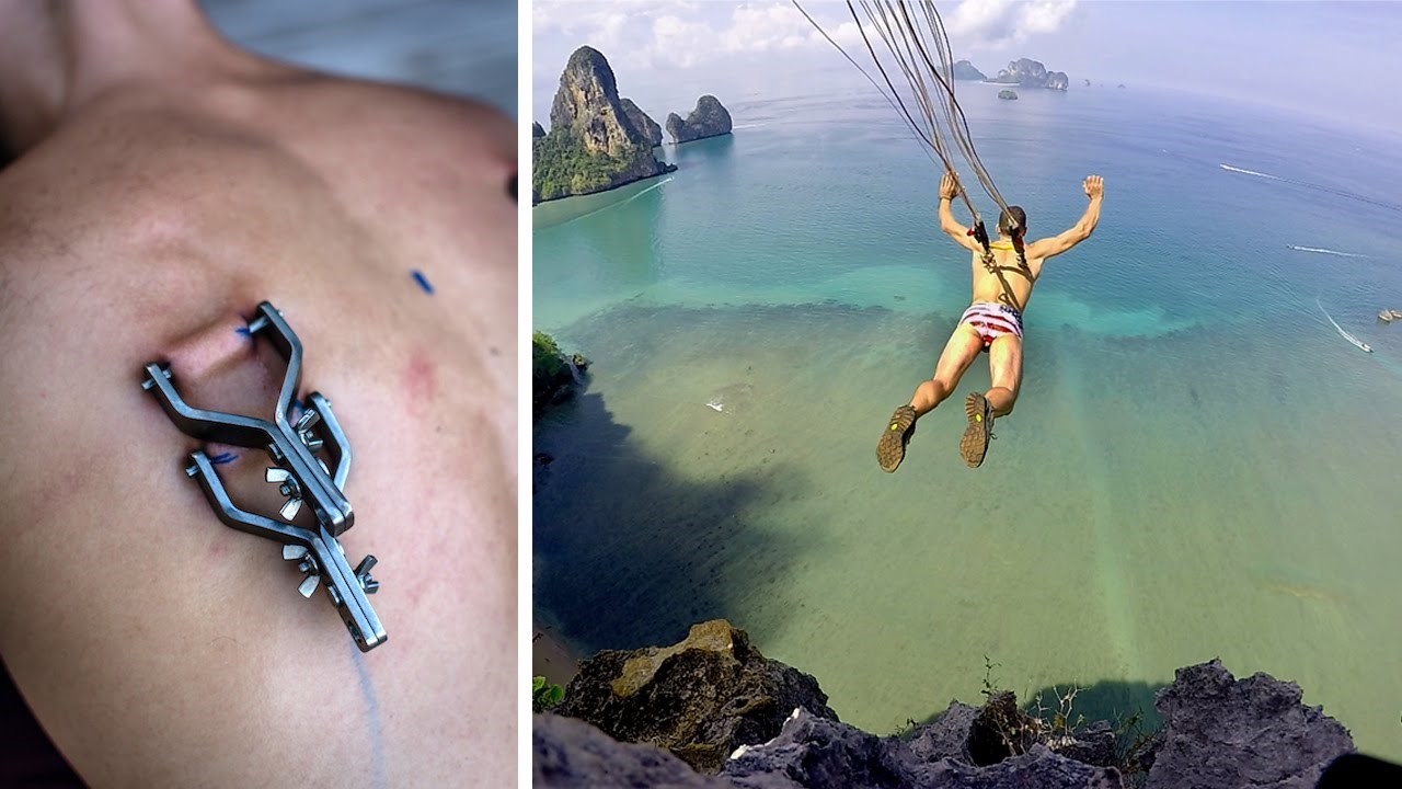 VIDEO: Luđak skočio padobranom zakačenim kukama za vlastitu kožu!