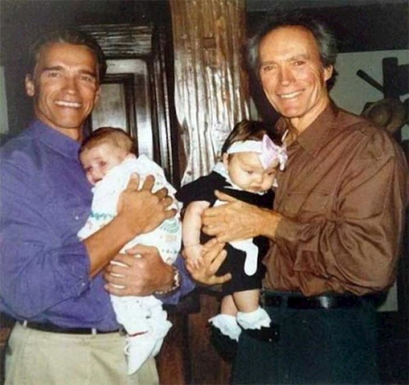 Arnold Schwarzenegger sa sinom Patrickom i Clint Eastwood s kćeri Francescom, 1993.godine