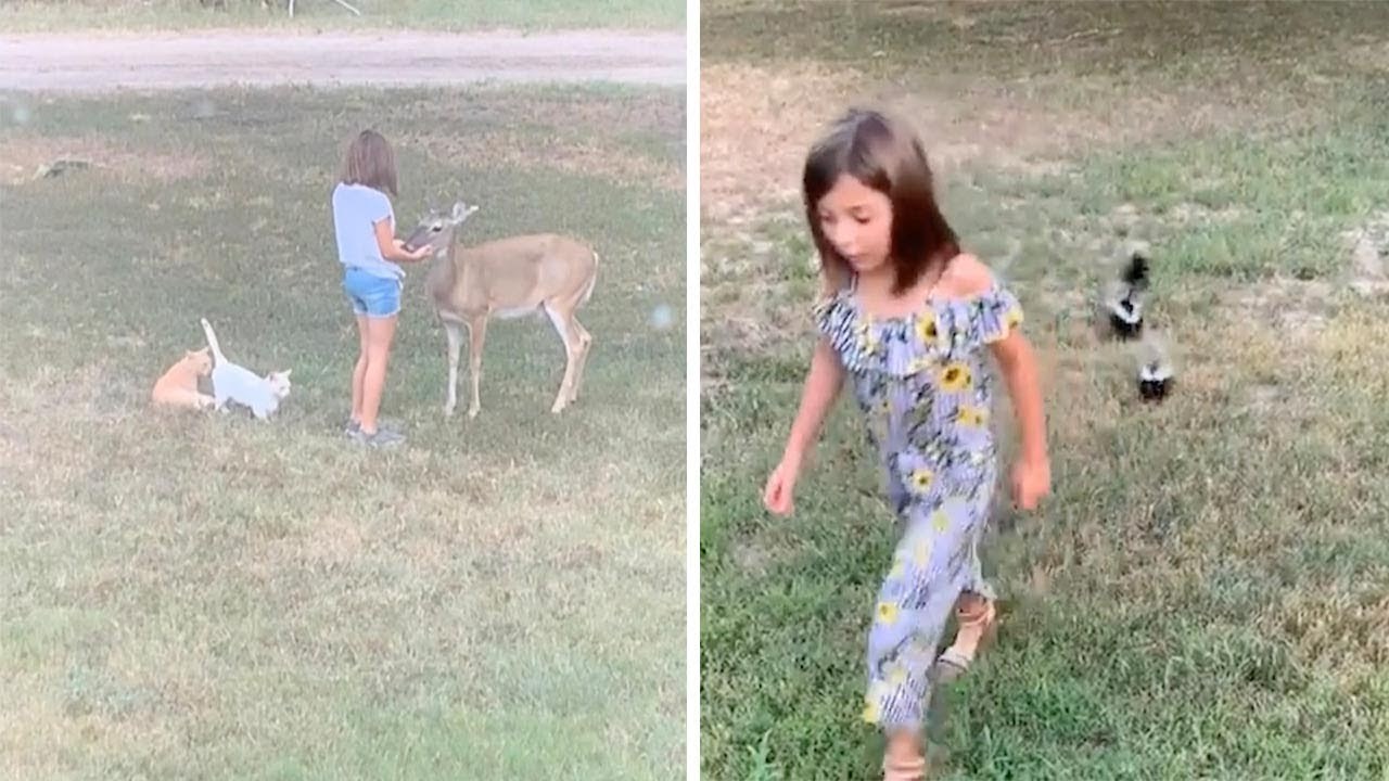 Mama je snimala kćer kako se igra vani, a onda je primijetila nešto čudno