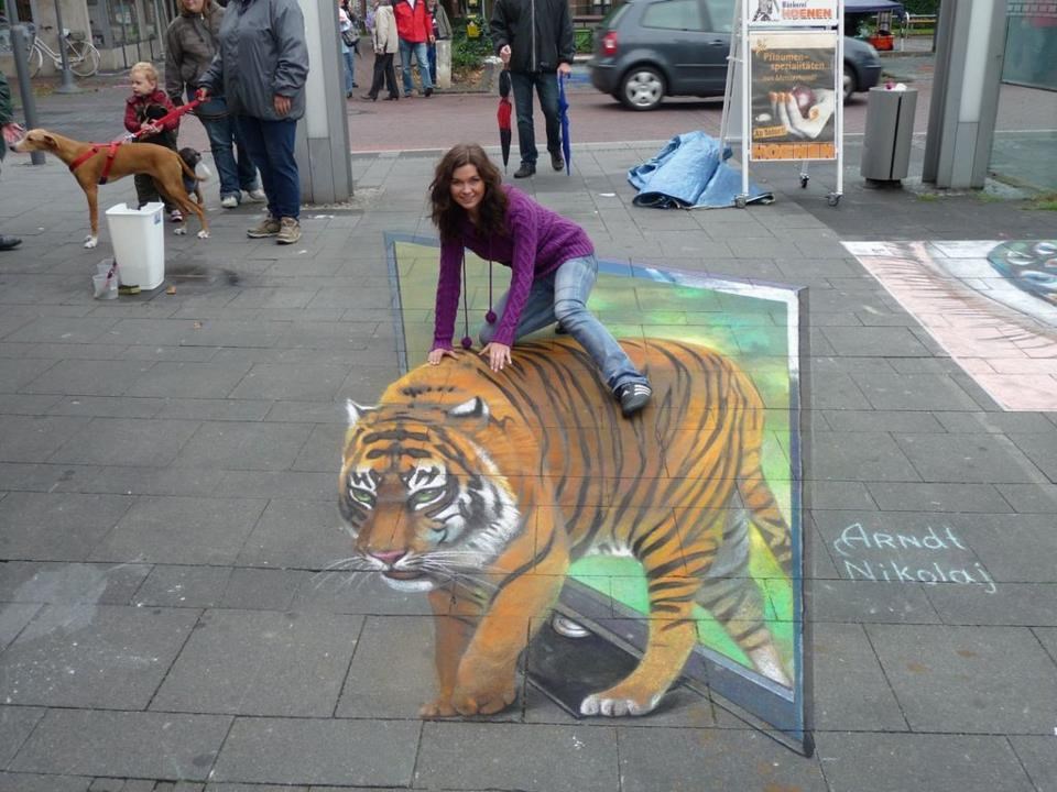 Kul 3D ulični grafit: "Zajašila" tigra
