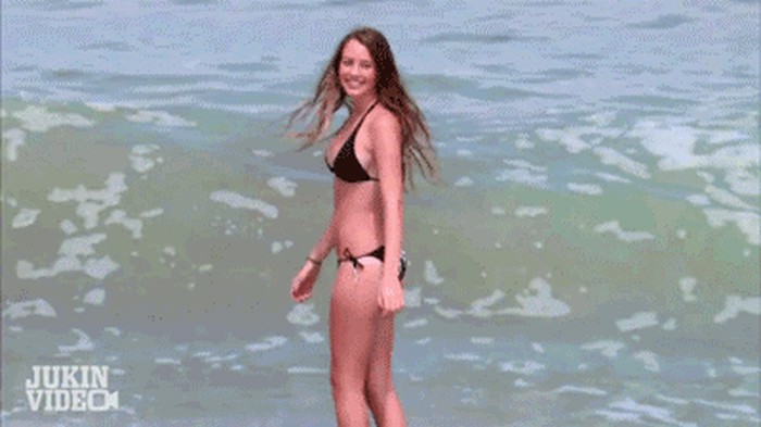 bikini-girl-hit-by-wave-gif.gif