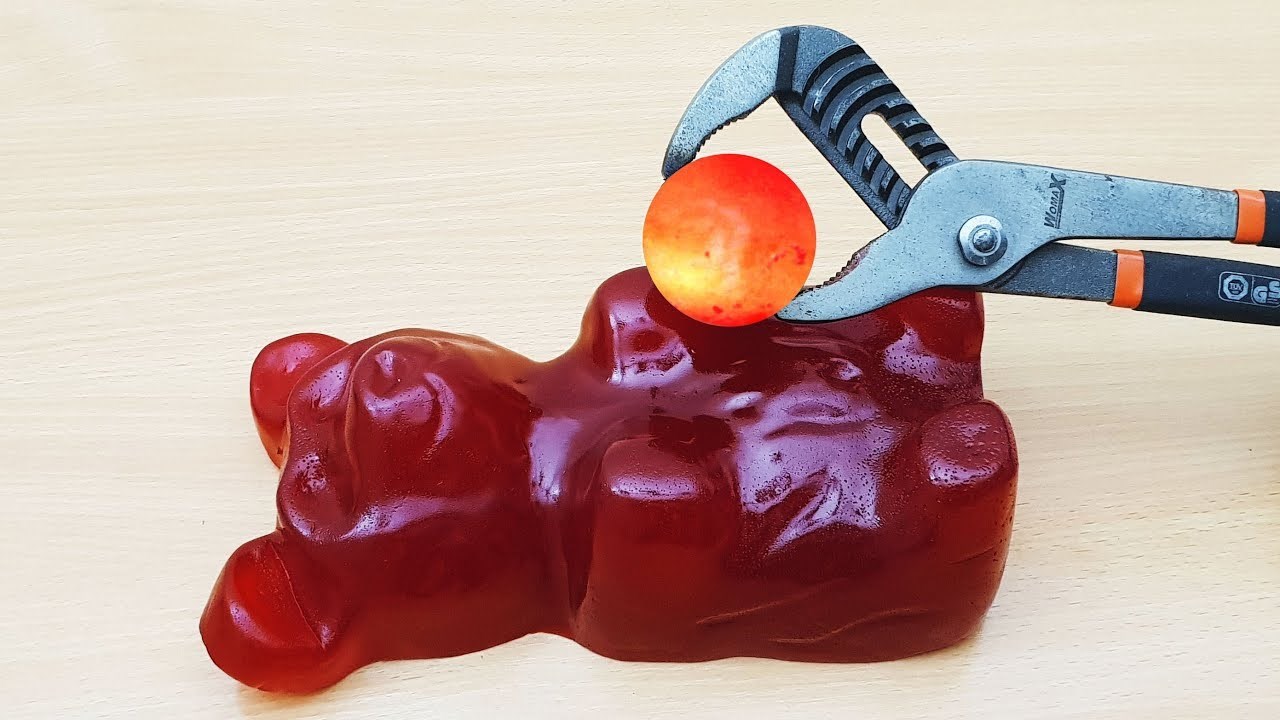 EXPERIMENT Glowing 1000 degree METAL BALL vs GIANT GUMMY BEAR